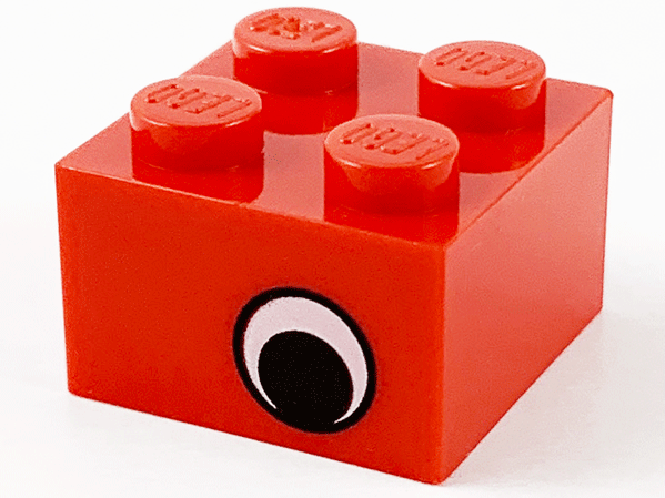 Brick 2 x 2 with Black and White Eye Offset Pattern on Opposite Sides