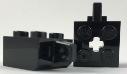 [P 30389b (Black)] Hinge Brick 2 x 2 Locking with 1 Finger Vertical and Axle Hole (+ Shape)